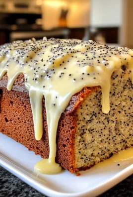 Irresistible Moist Lemon Poppy Seed Loaf with Cream Cheese Frosting