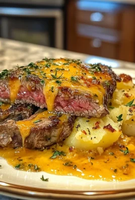 Garlic Butter Steak & Cheddar Potato Bake
