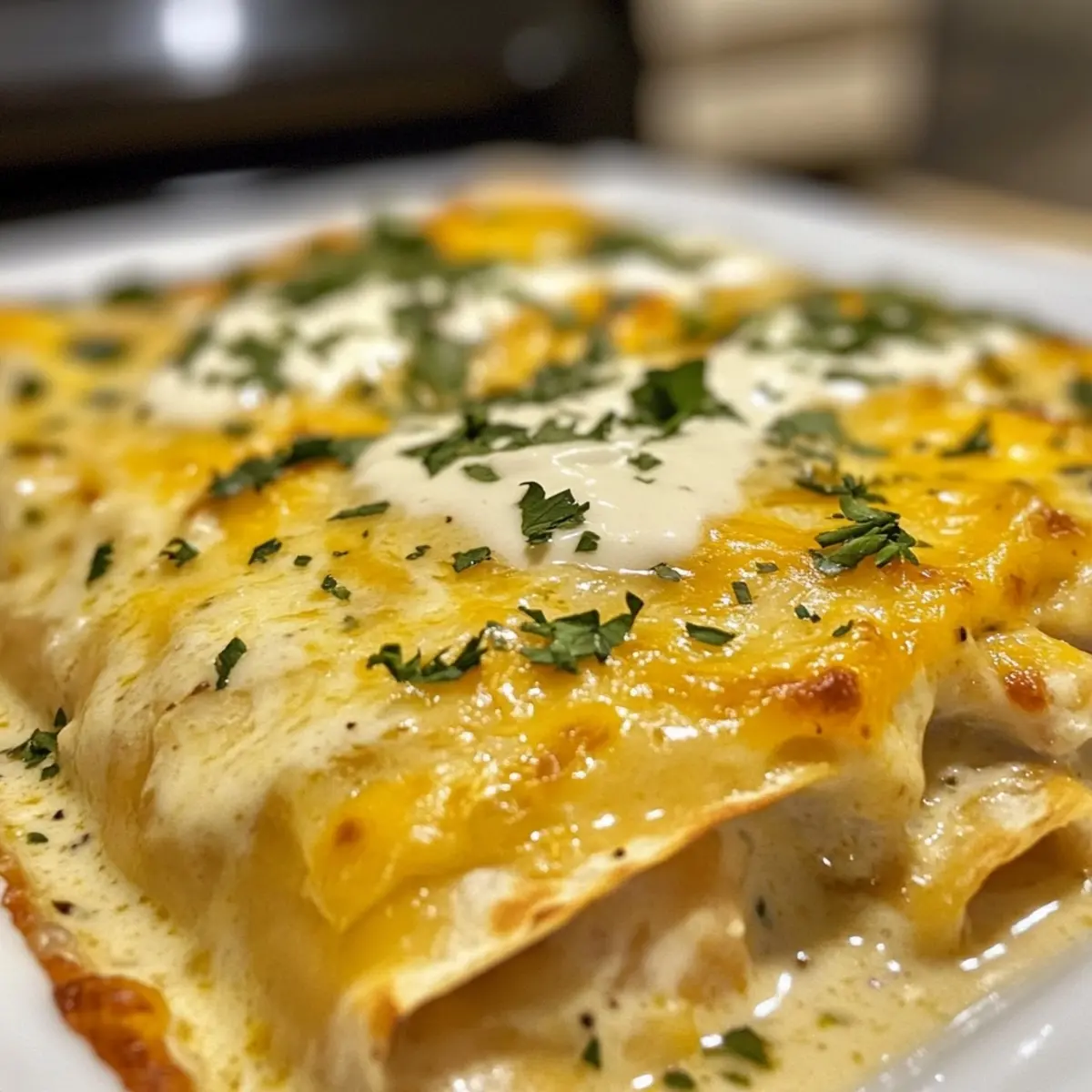 CHICKEN ENCHILADAS WITH SOUR CREAM WHITE SAUCE